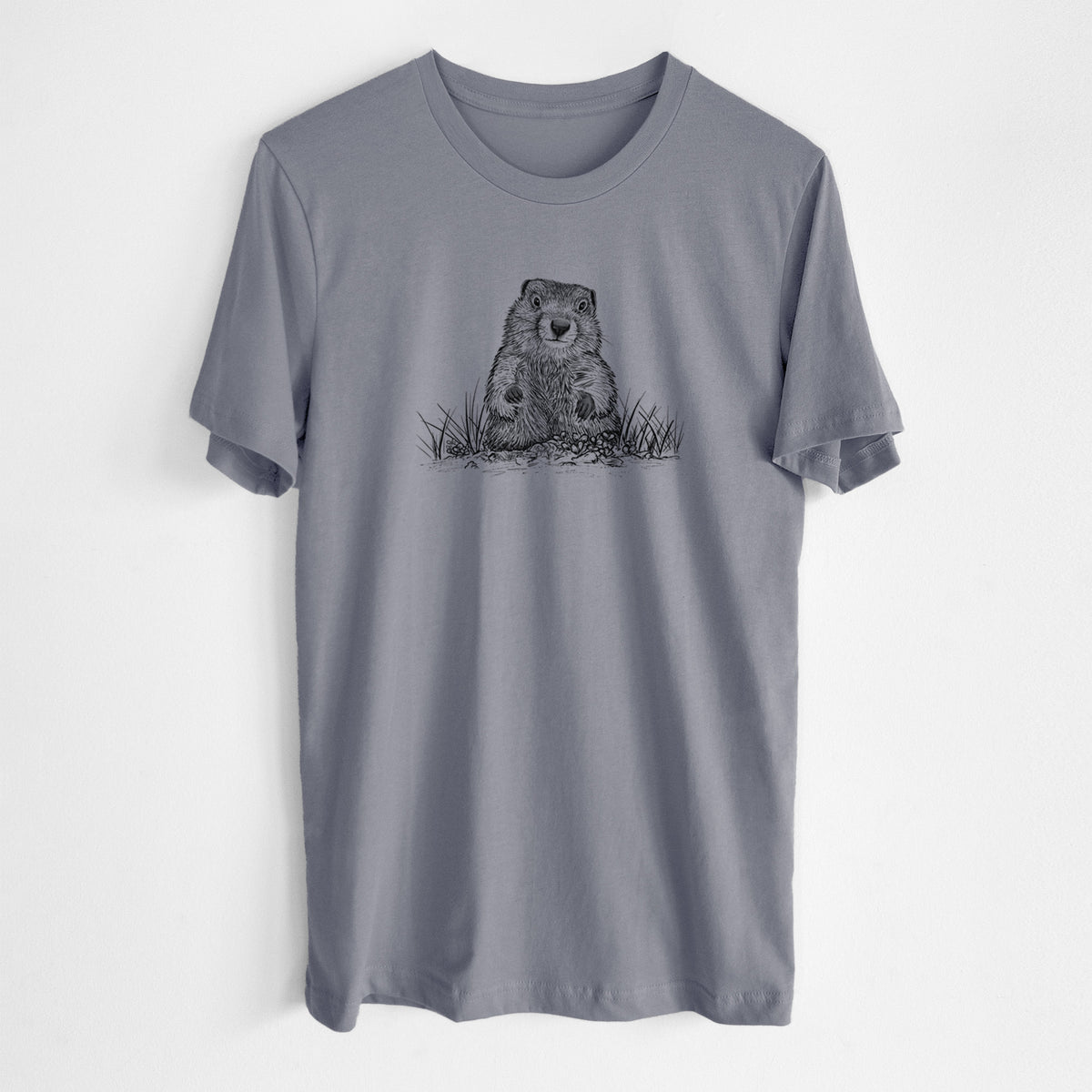 Storm grey lightweight cotton t-shirt laid flat, printed with a black ink illustration of a groundhog peeking out of its burrow among grass.
