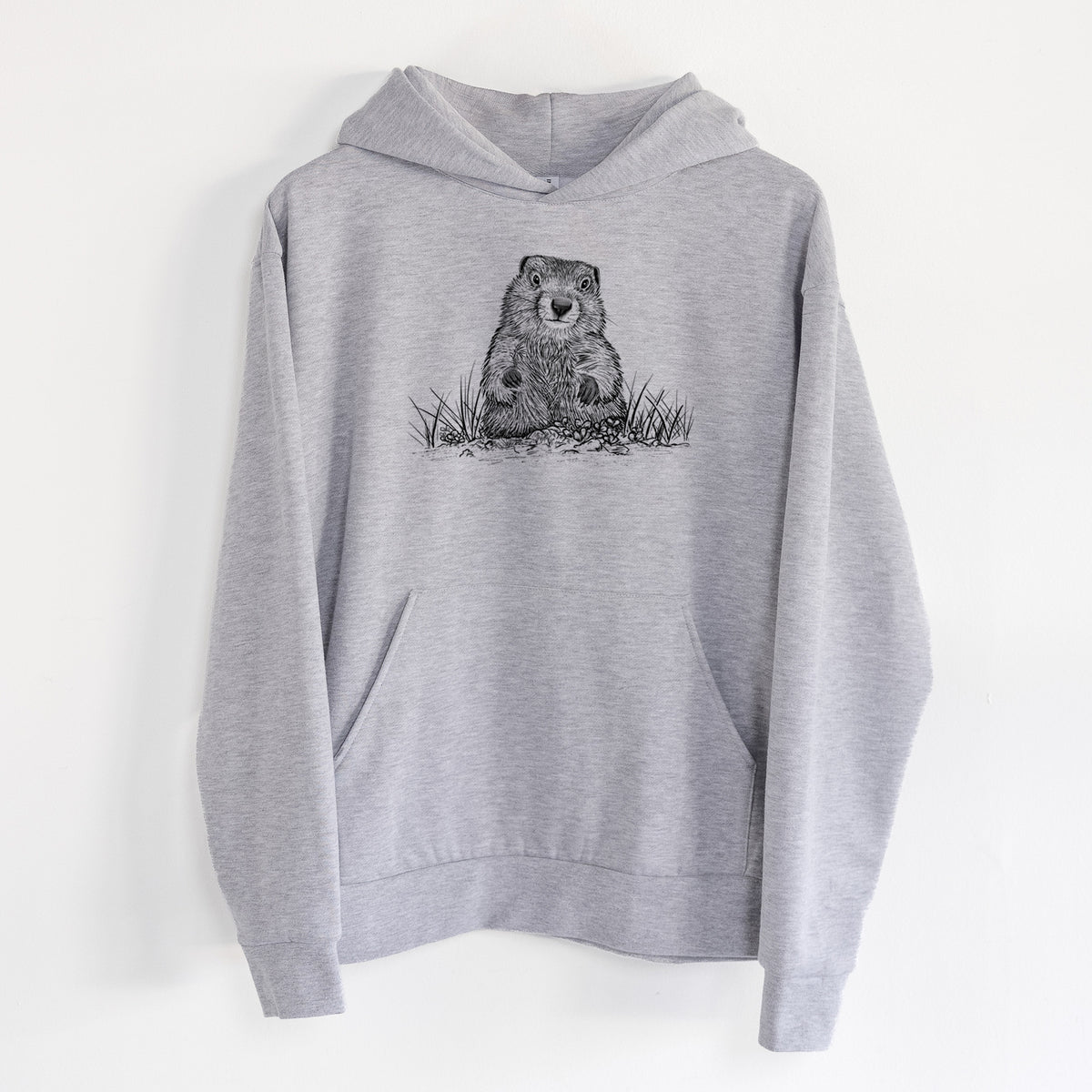 Groundhog - Marmota Monax - Statement Midweight Hoodie in Heather Grey, hanging on a white wall, with a front kangaroo pocket and no drawcords.