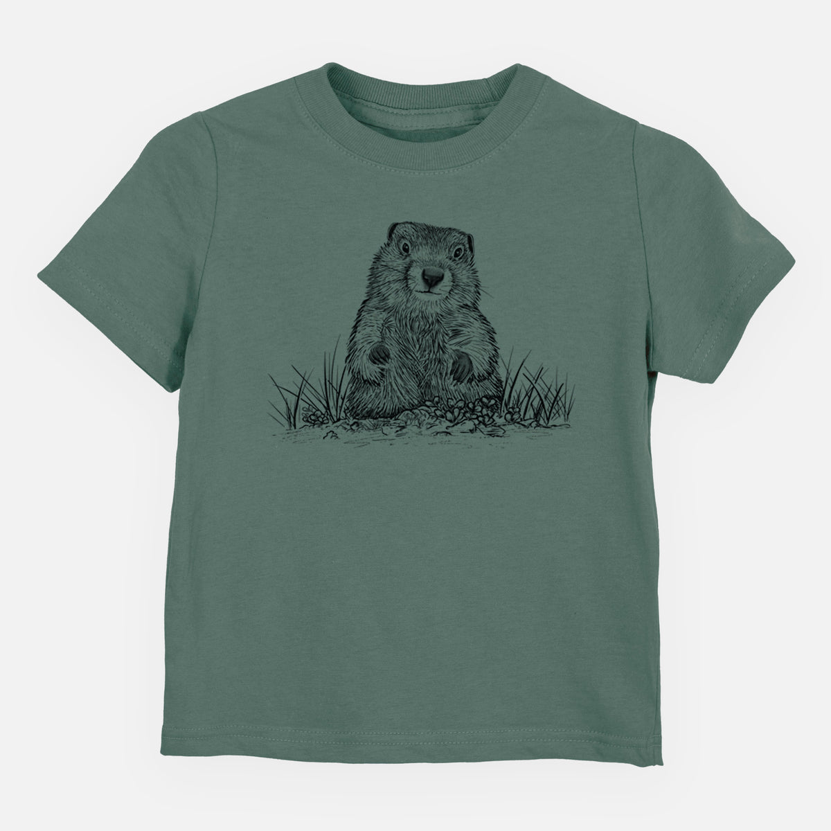 Basil green toddler t-shirt laid flat, printed with a black ink illustration of a groundhog peeking out of its burrow among grass.