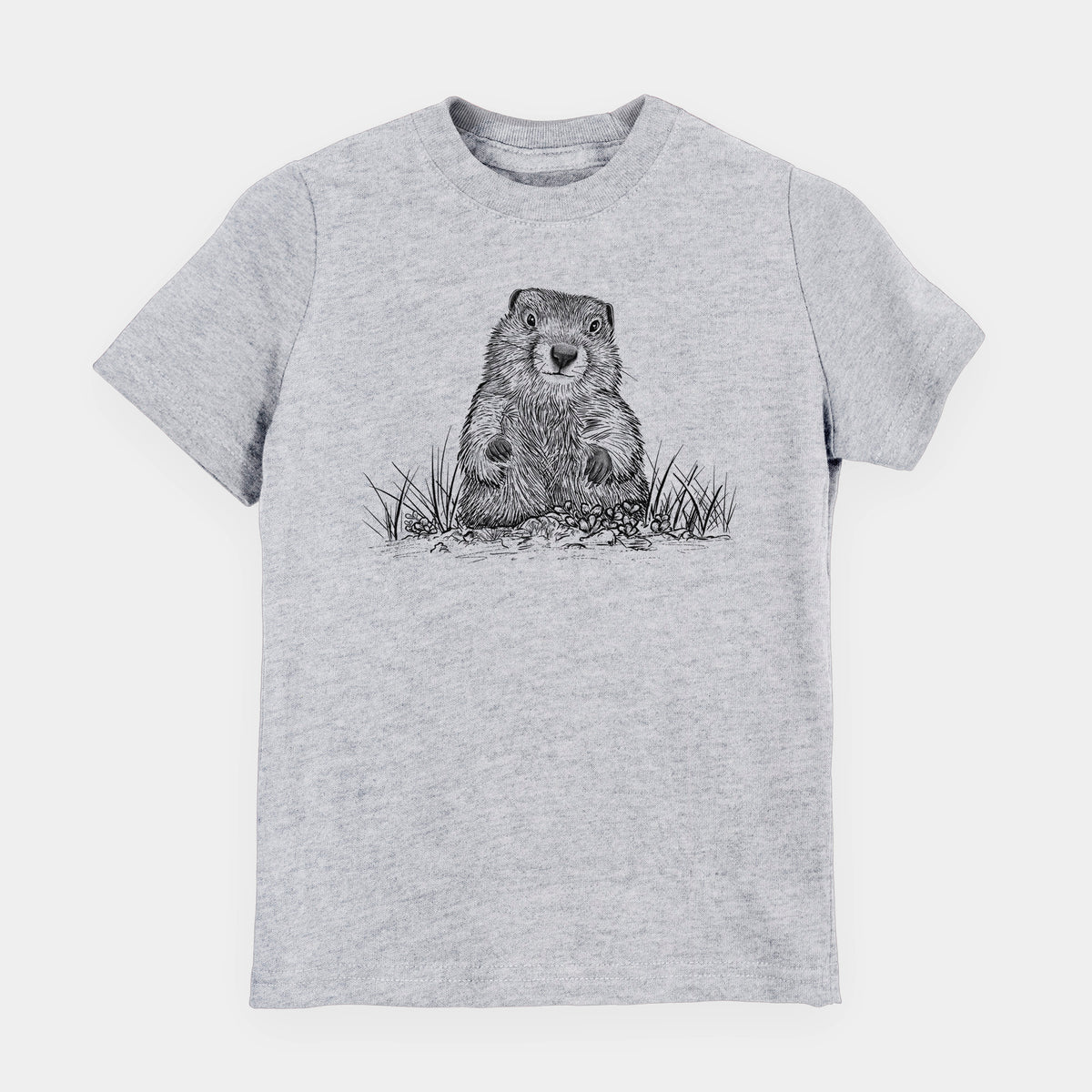 Heather grey youth t-shirt laid flat, printed with a black ink illustration of a groundhog peeking out of its burrow among grass.
