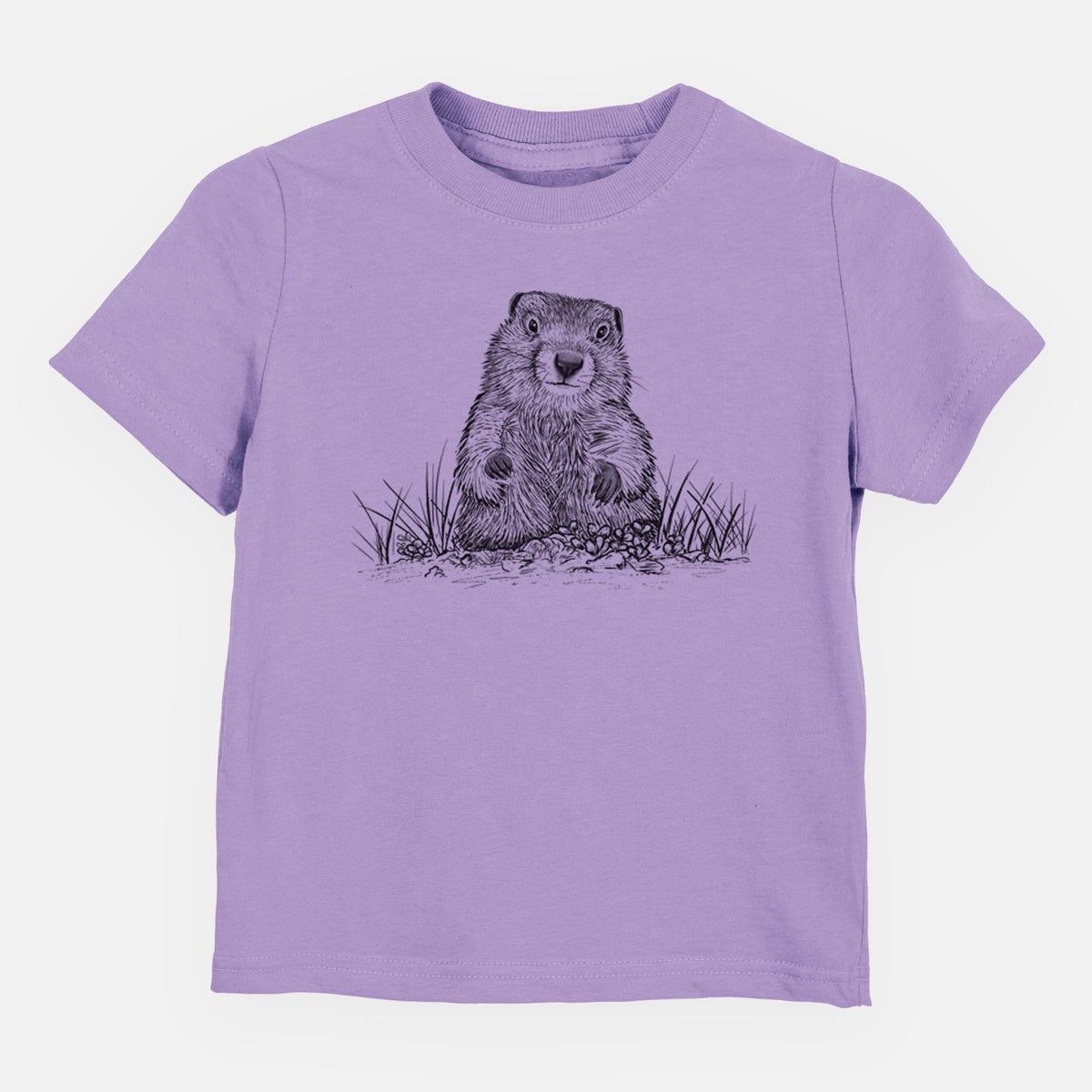 Lavender toddler t-shirt laid flat, printed with a black ink illustration of a groundhog peeking out of its burrow among grass.