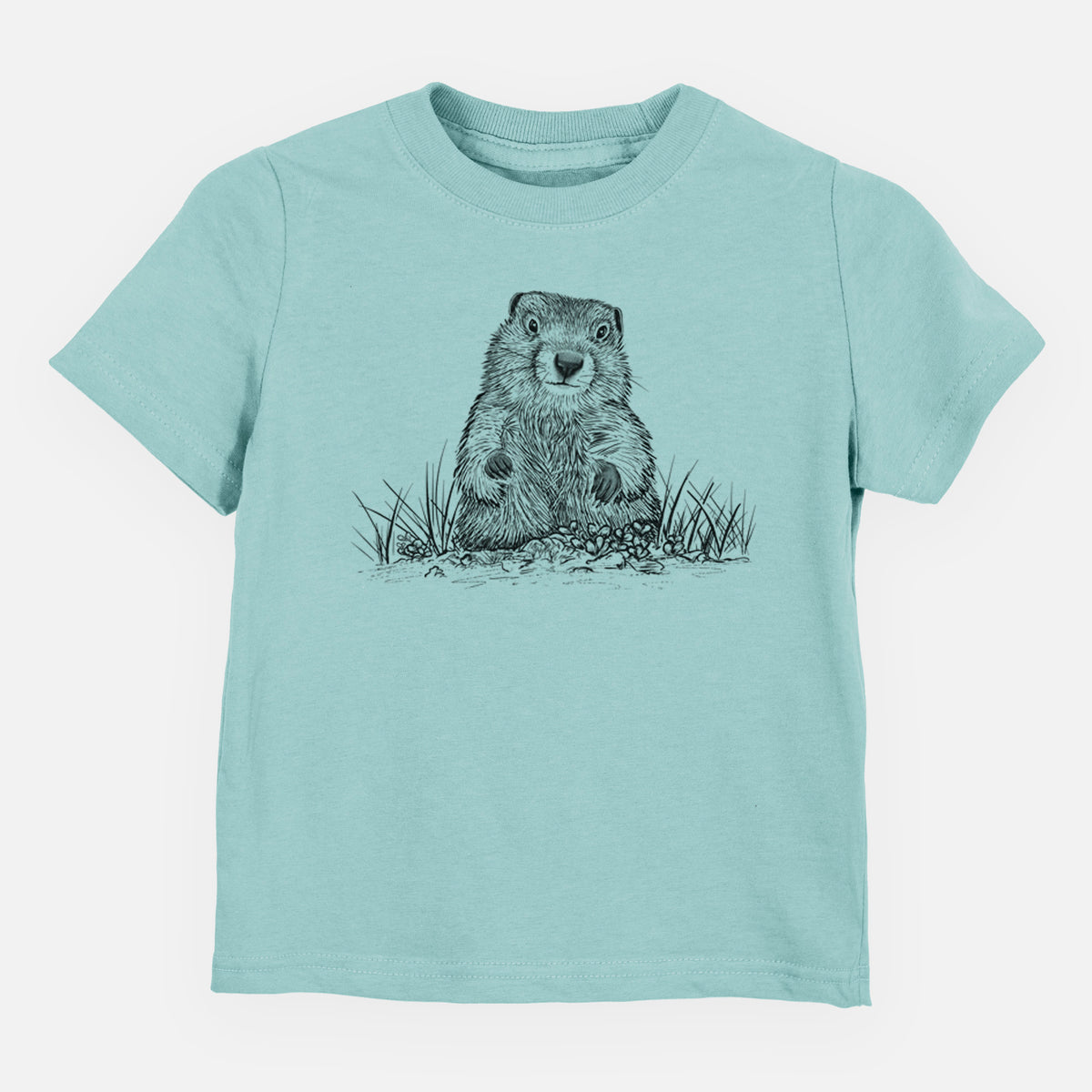 Saltwater toddler t-shirt laid flat, printed with a black ink illustration of a groundhog peeking out of its burrow among grass.