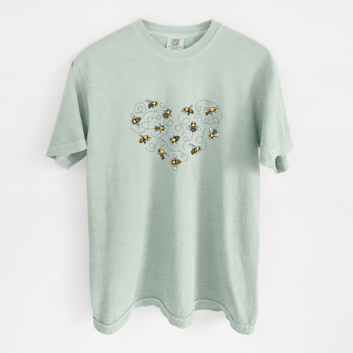 Bay green Comfort Colors t-shirt laid flat, printed with a heart shape made of small bees and looping flight trails.