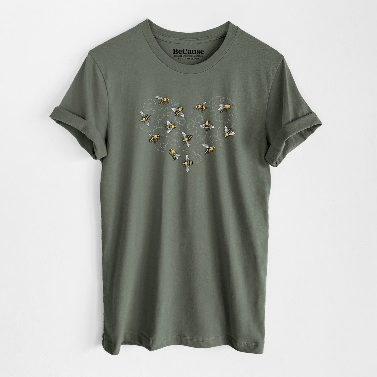 Military green lightweight cotton t-shirt laid flat, printed with a heart shape made of small bees and looping flight trails.
