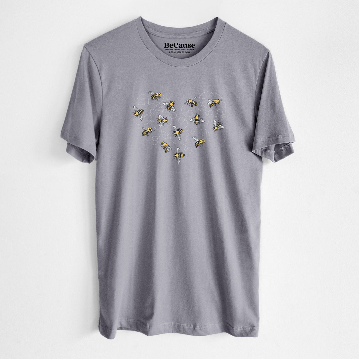 Storm grey lightweight cotton t-shirt laid flat, printed with a heart shape made of small bees and looping flight trails.
