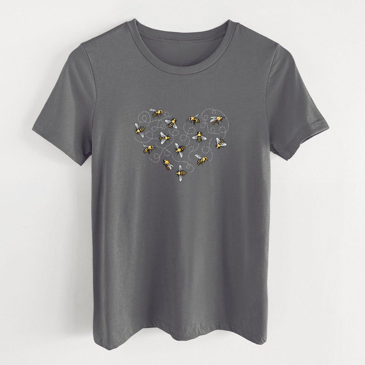 Asphalt women's relaxed fit cotton t-shirt laid flat, printed with a heart shape made of small bees and looping flight trails.
