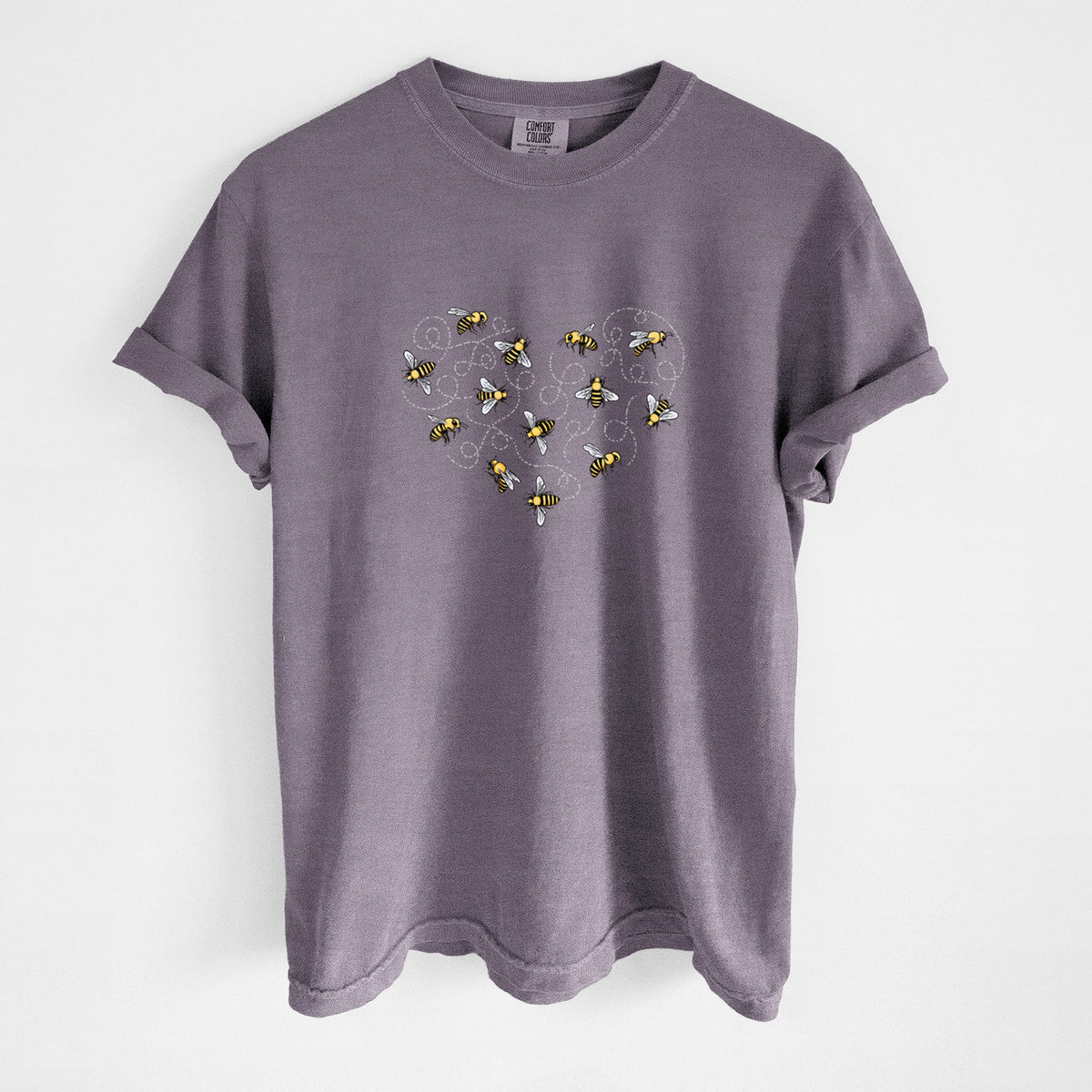 Wine red Comfort Colors t-shirt laid flat, printed with a heart shape made of small bees and looping flight trails.