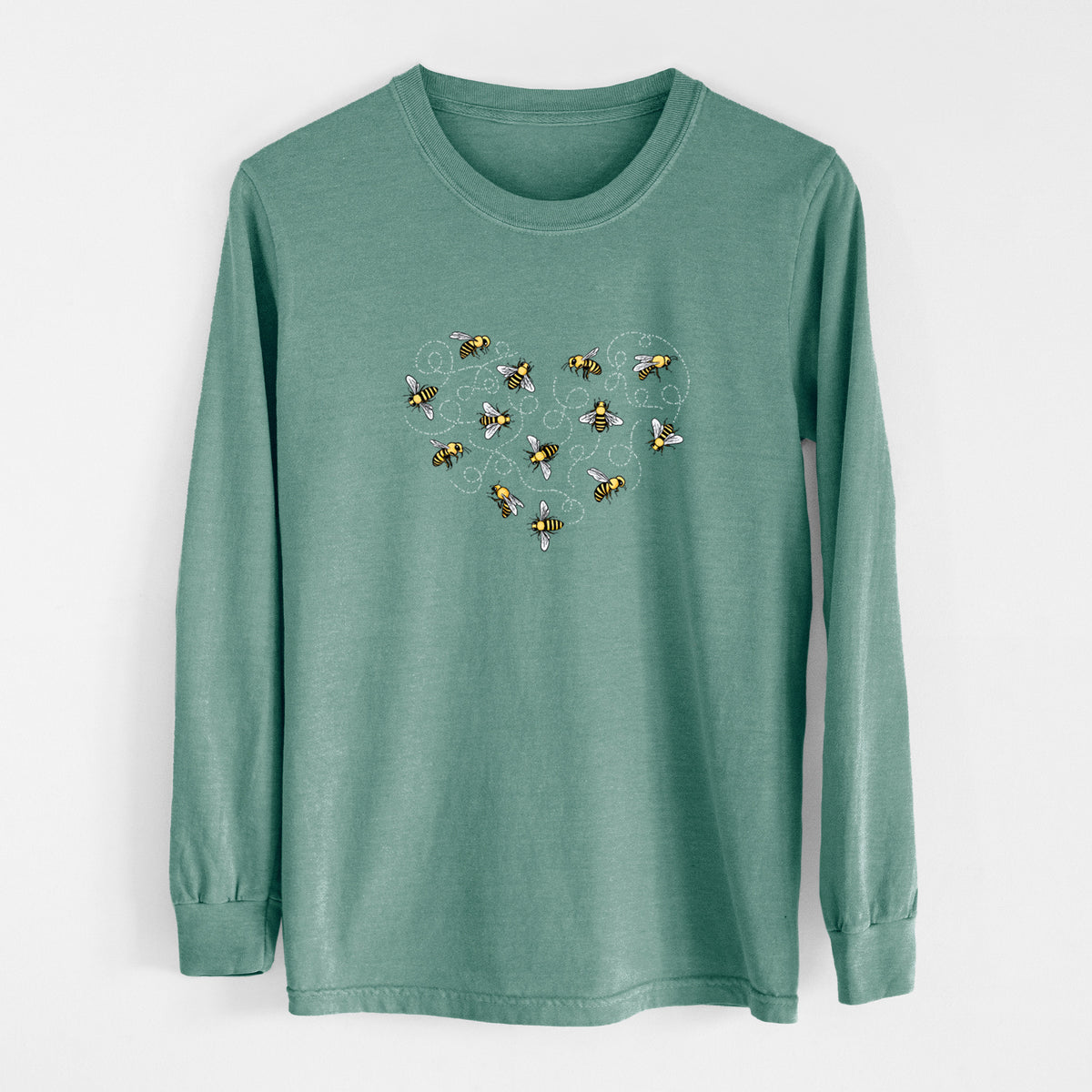 Pine green Comfort Colors long sleeve shirt laid flat, printed with a heart shape made of small bees and looping flight trails.