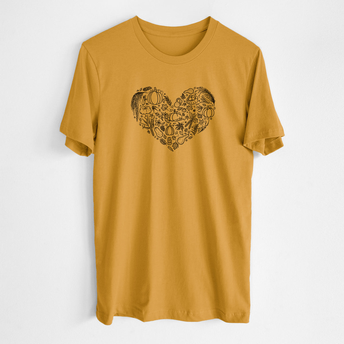 Honeycomb yellow lightweight cotton t-shirt laid flat, printed with a heart shape filled with black ink autumn leaves, acorns, pumpkins and mushrooms.