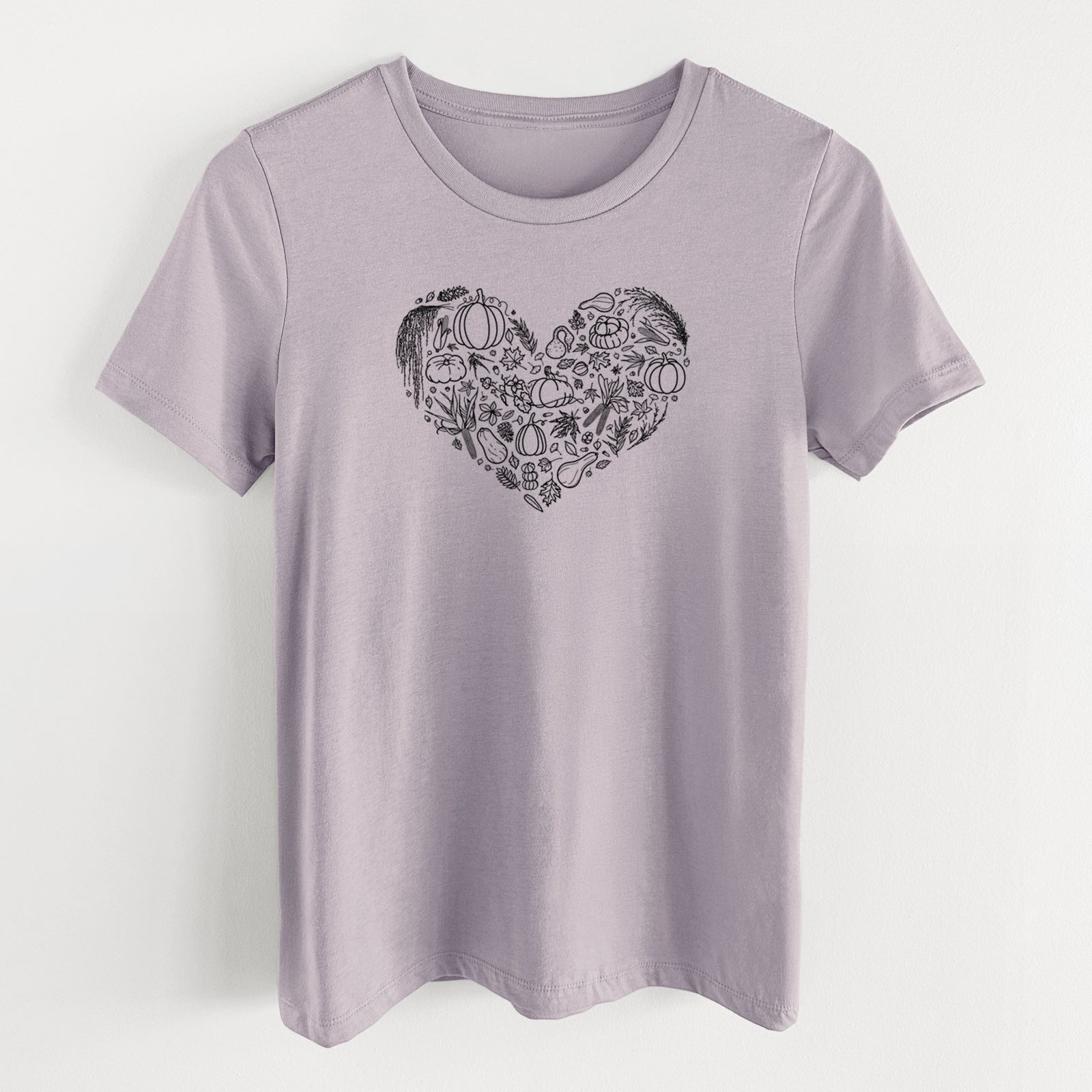 Light violet women's relaxed fit cotton t-shirt laid flat, printed with a heart shape filled with black ink autumn leaves, acorns, pumpkins and mushrooms.