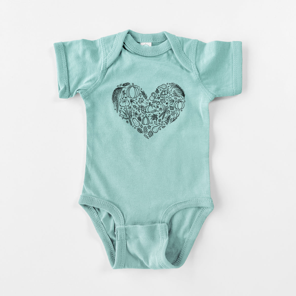 Saltwater baby bodysuit laid flat, printed with a heart shape filled with black ink autumn leaves, acorns, pumpkins and mushrooms.