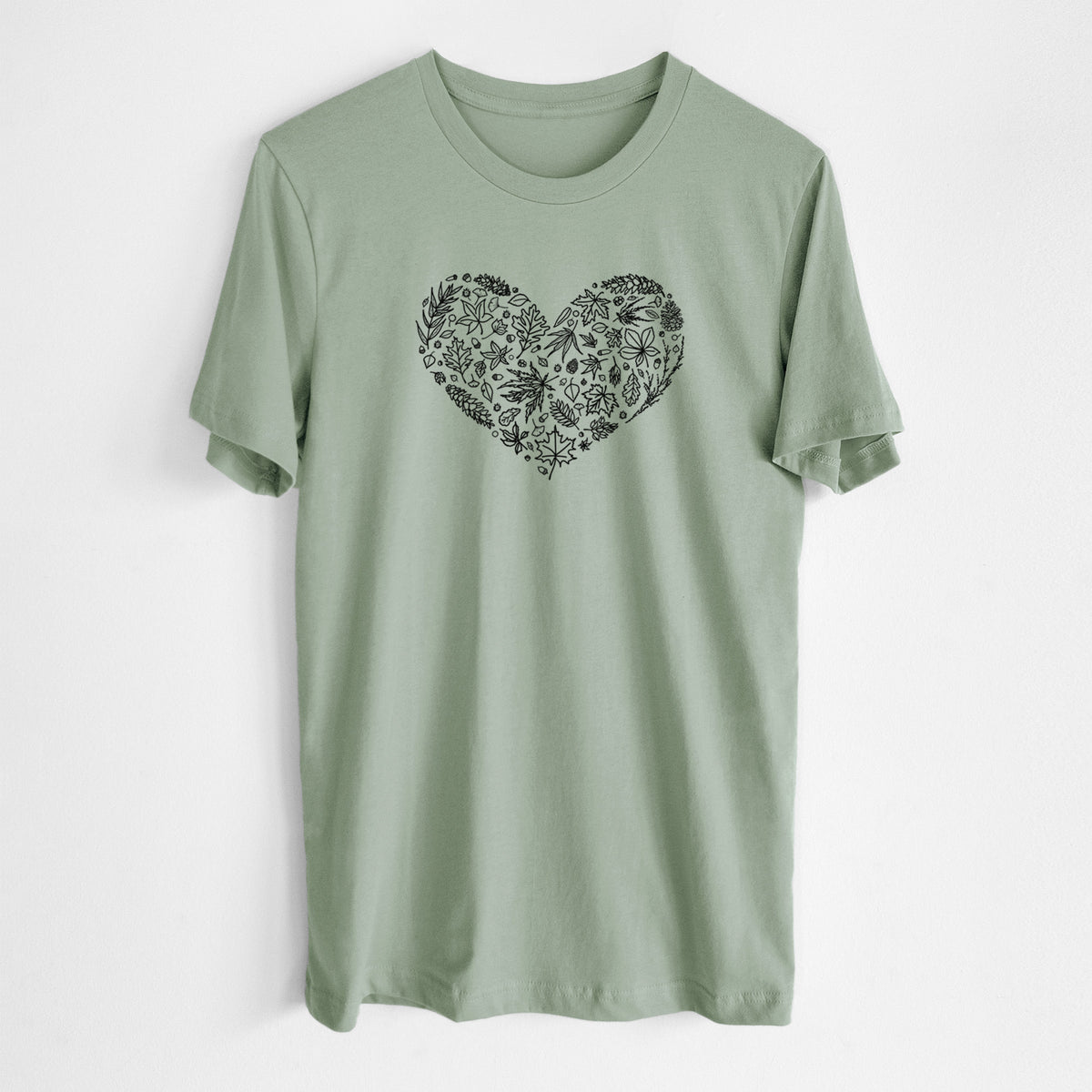 Sage green lightweight cotton t-shirt laid flat, printed with a heart shape filled with black ink autumn leaves.