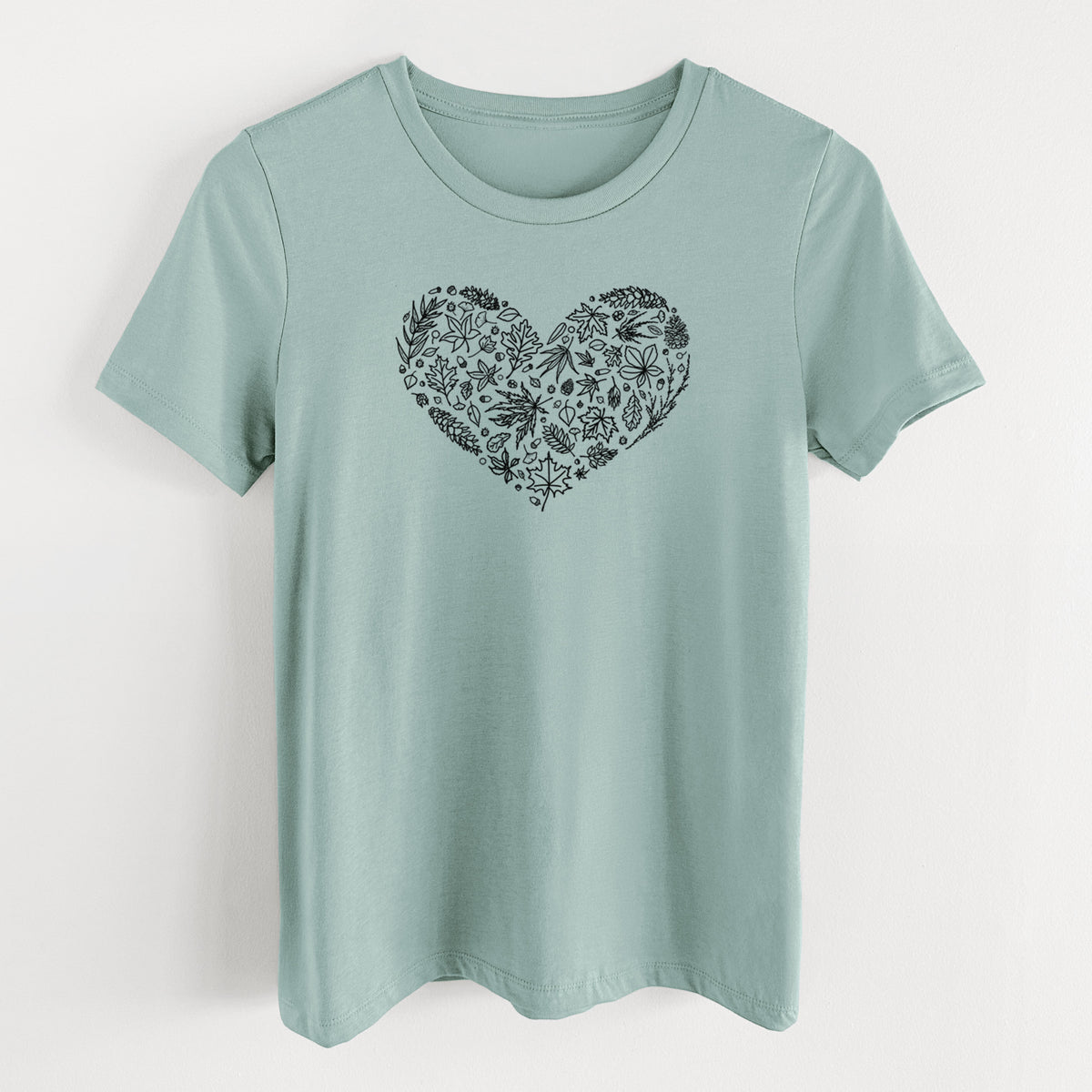 Dusty blue women's relaxed fit cotton t-shirt laid flat, printed with a heart shape filled with black ink autumn leaves.