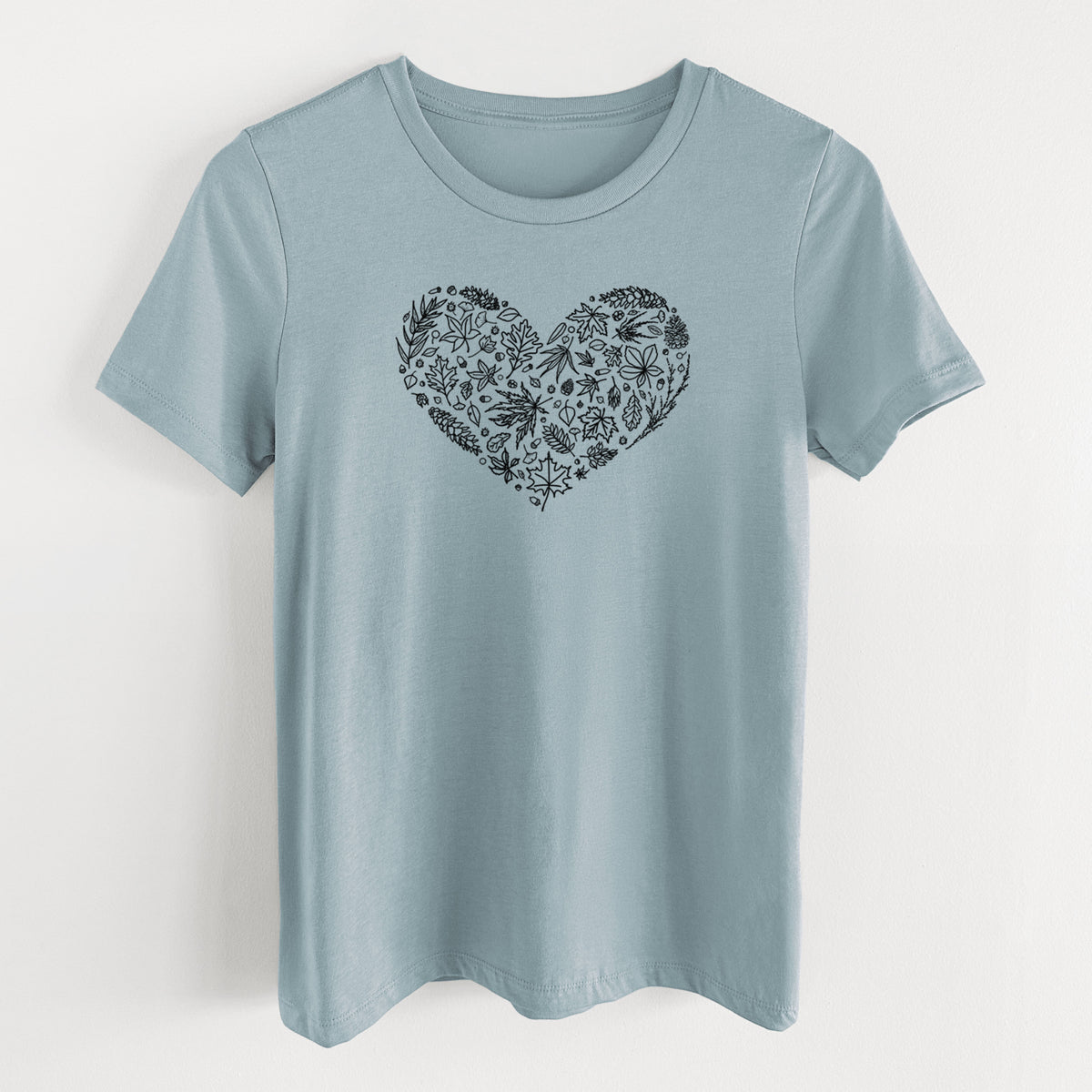 Vintage denim women's relaxed fit cotton t-shirt laid flat, printed with a heart shape filled with black ink autumn leaves.
