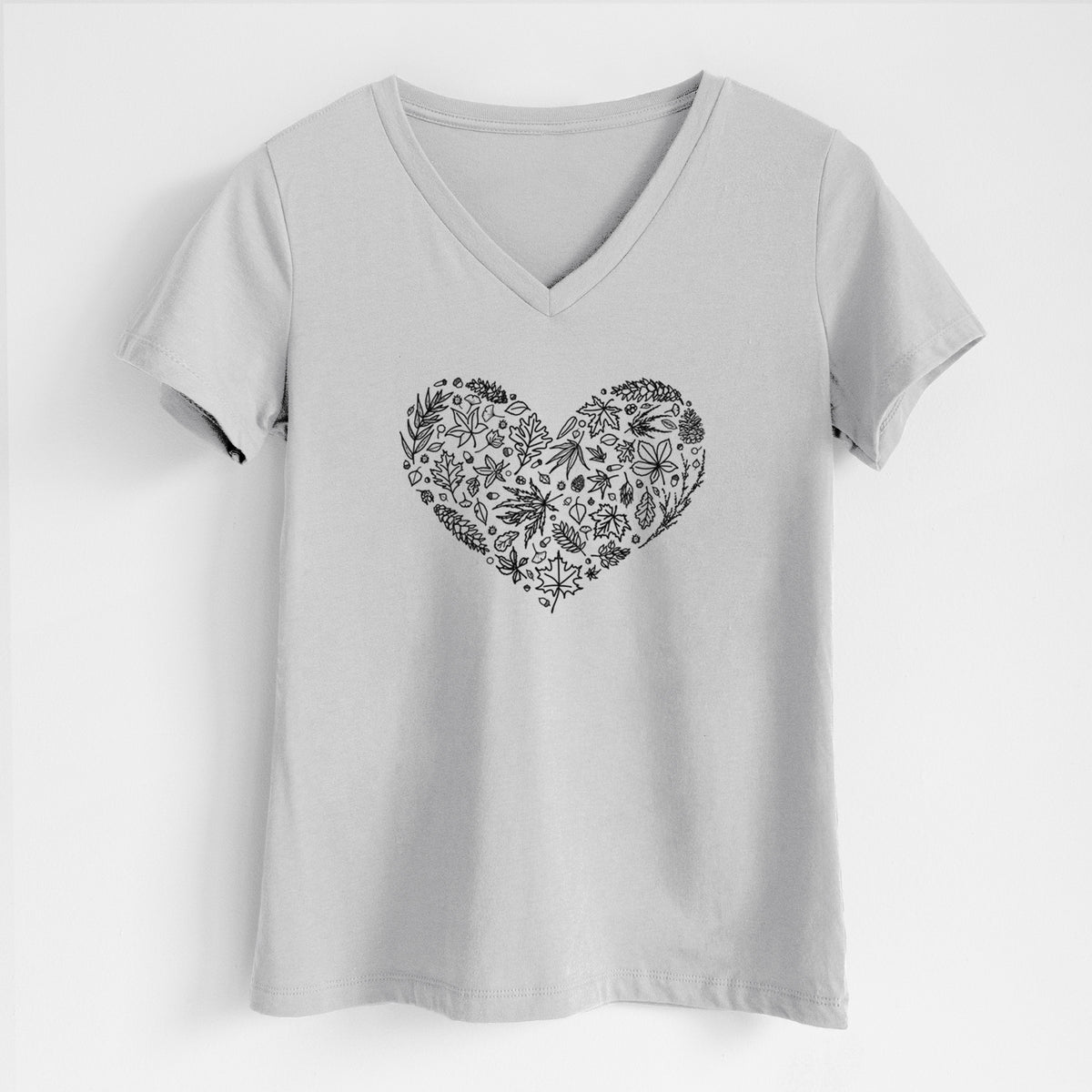 Lunar grey women's relaxed fit cotton V-neck t-shirt laid flat, printed with a heart shape filled with black ink autumn leaves.
