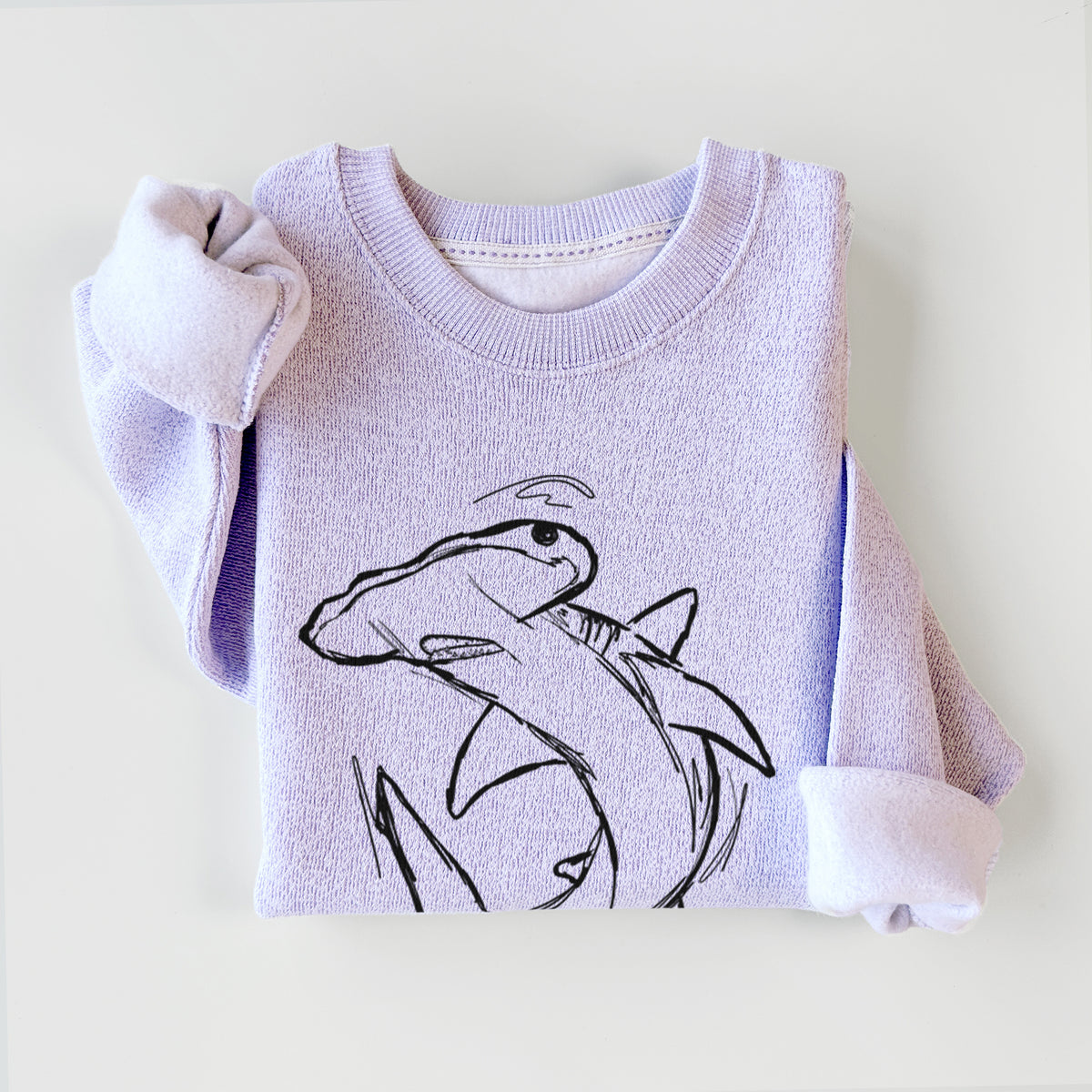 Ice purple knit sweatshirt printed with a black ink illustration of a hammerhead shark swimming in a curve, styled flat.