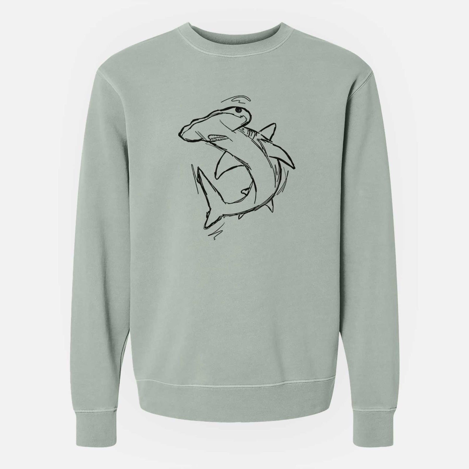 Sage green pigment dyed crewneck sweatshirt laid flat, printed with a black ink illustration of a hammerhead shark swimming in a curve.