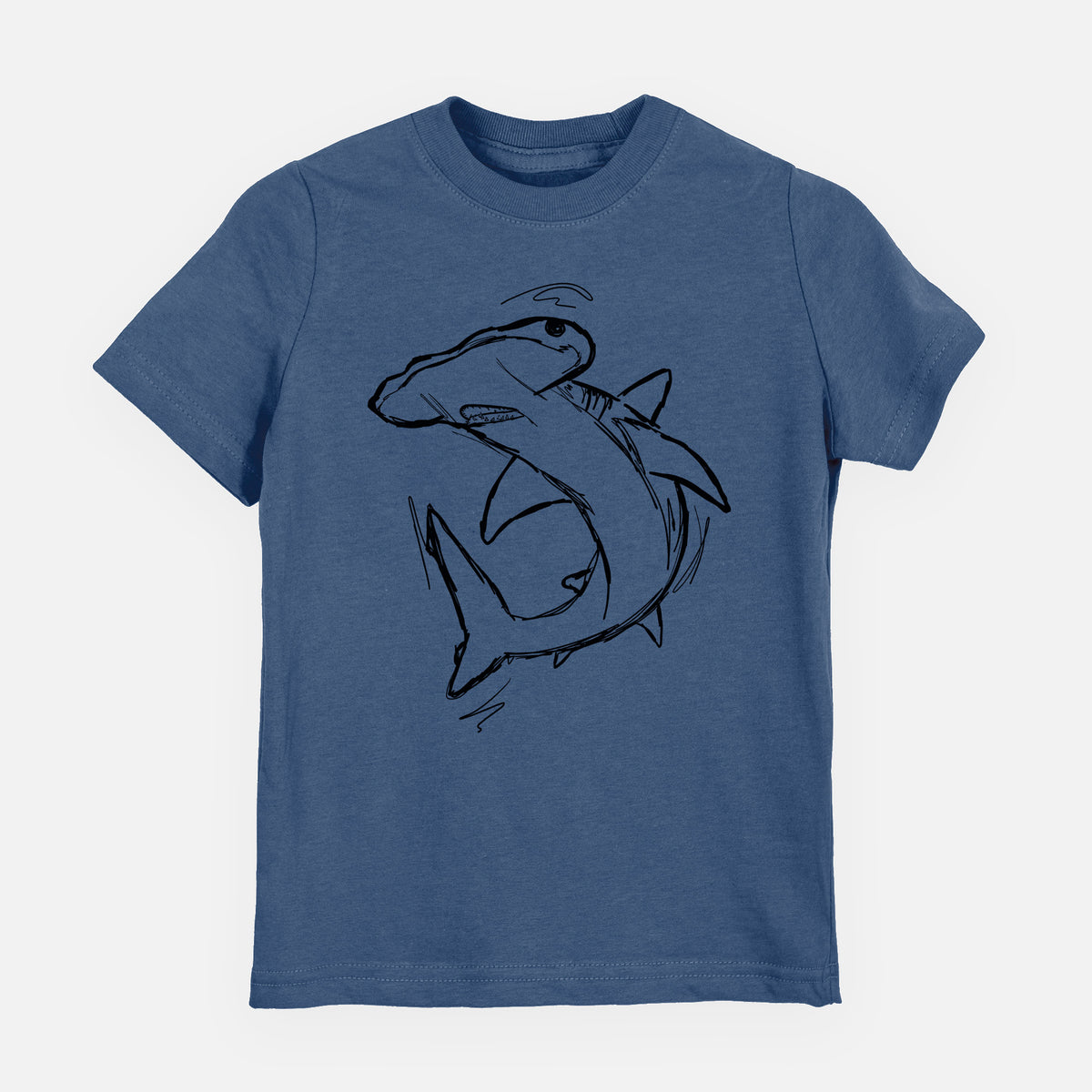 Indigo blue youth t-shirt laid flat, printed with a black ink illustration of a hammerhead shark swimming in a curve.