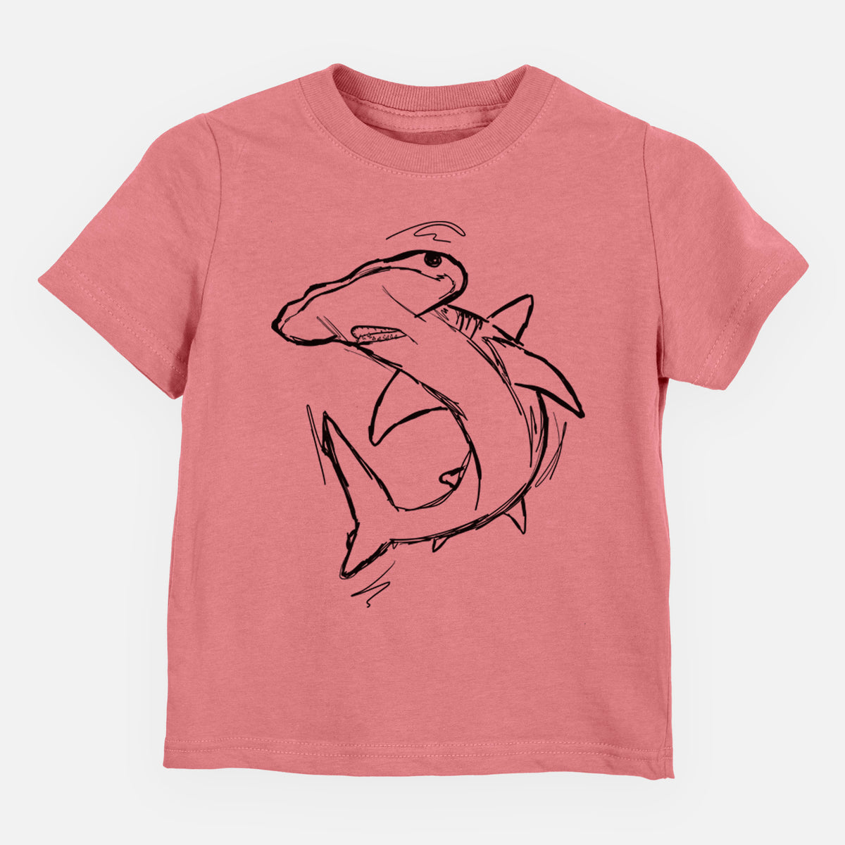 Mauve pink toddler t-shirt laid flat, printed with a black ink illustration of a hammerhead shark swimming in a curve.