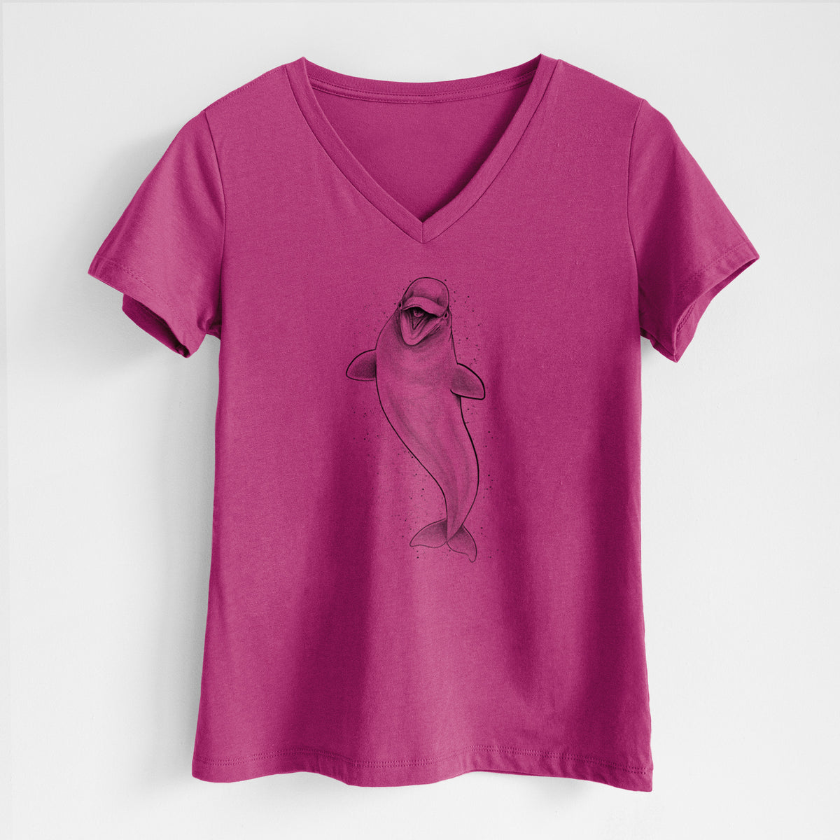 Berry pink women's relaxed fit cotton V-neck t-shirt laid flat, printed with a black ink illustration of a smiling beluga whale swimming upward.