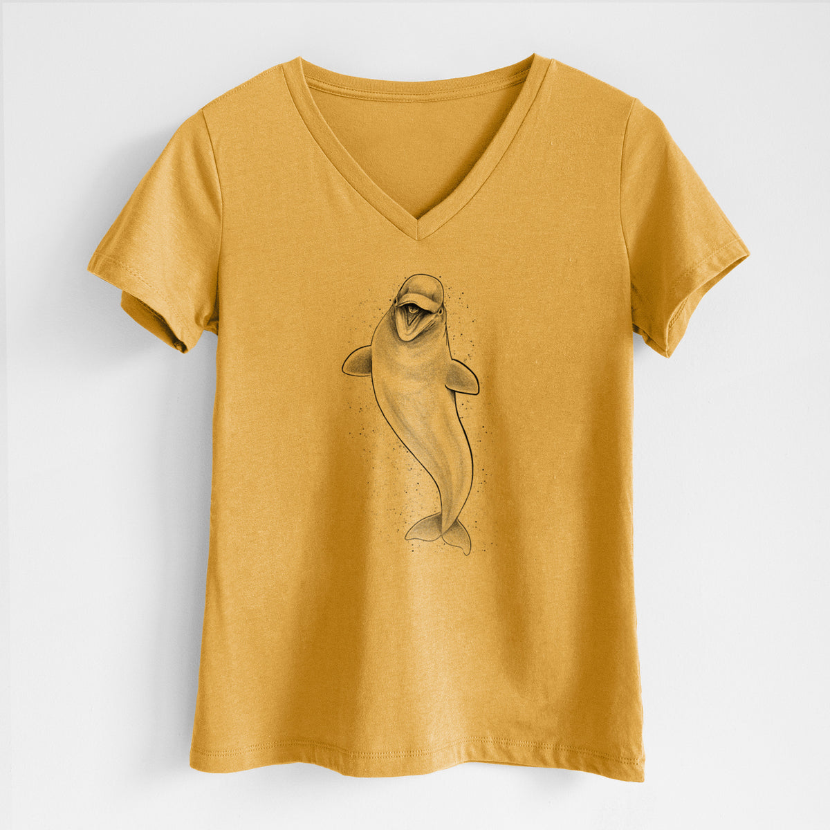Honeycomb yellow women's relaxed fit cotton V-neck t-shirt laid flat, printed with a black ink illustration of a smiling beluga whale swimming upward.