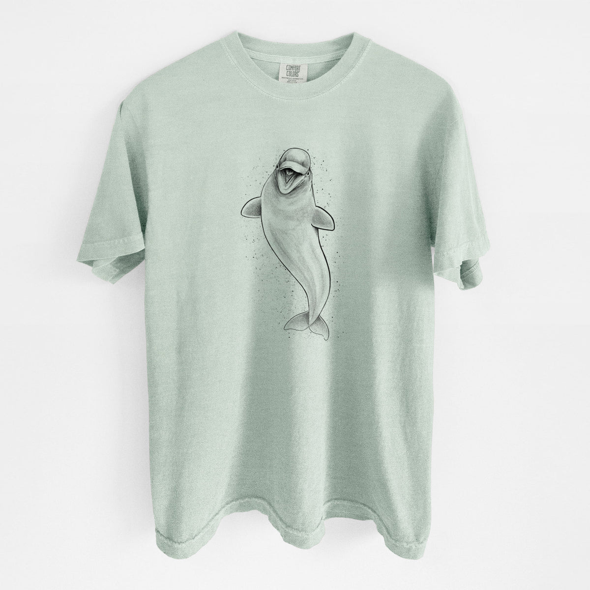 Bay green Comfort Colors t-shirt laid flat, printed with a black ink illustration of a smiling beluga whale swimming upward.