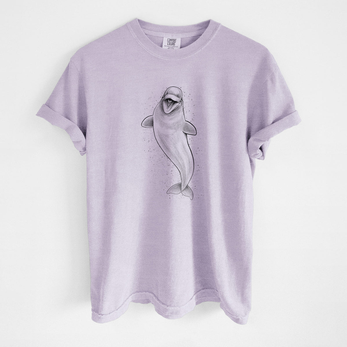 Orchid purple Comfort Colors t-shirt laid flat, printed with a black ink illustration of a smiling beluga whale swimming upward.