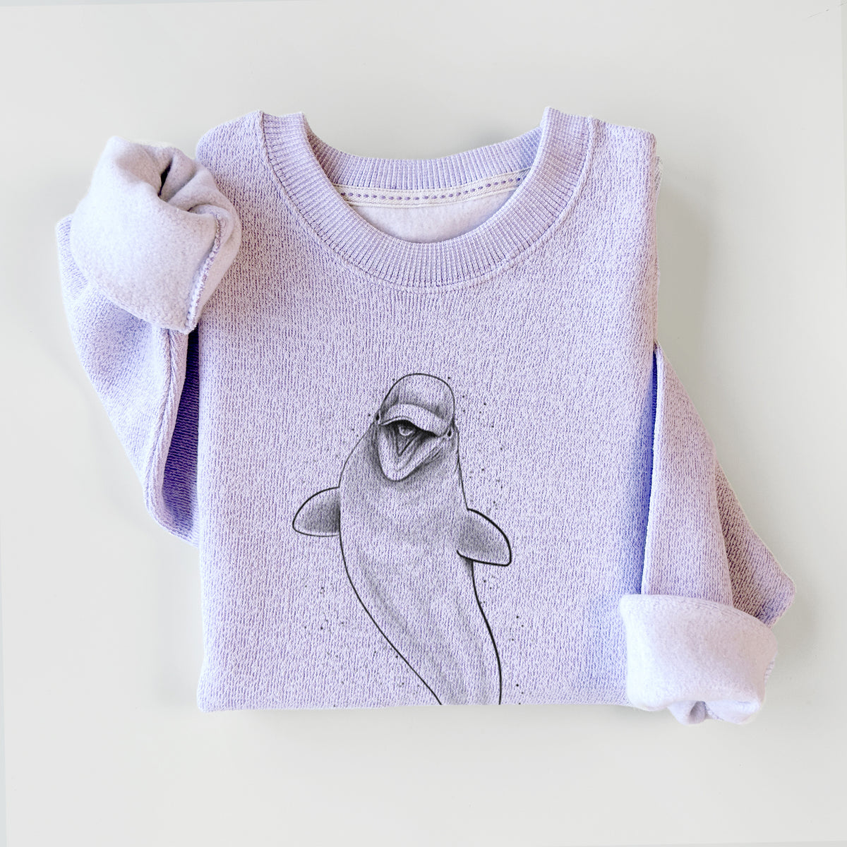 Ice purple knit sweatshirt printed with a black ink illustration of a smiling beluga whale swimming upward, styled flat.