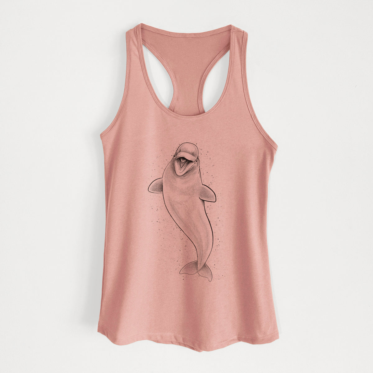 Desert pink women's racerback tank top laid flat, printed with a black ink illustration of a smiling beluga whale swimming upward.