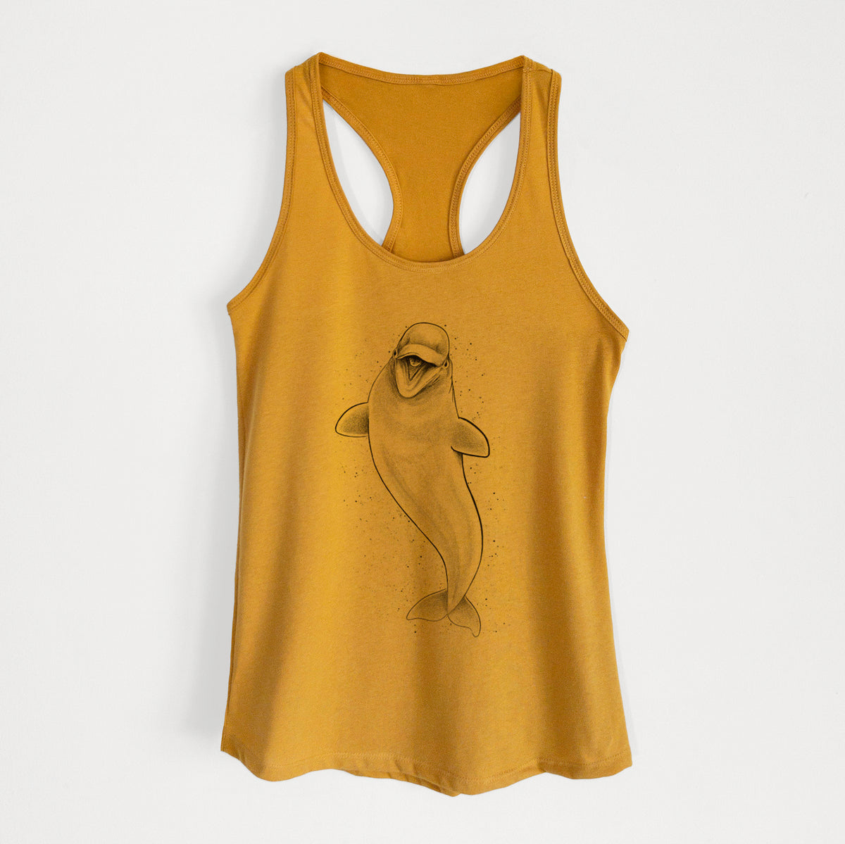 Gold women's racerback tank top laid flat, printed with a black ink illustration of a smiling beluga whale swimming upward.