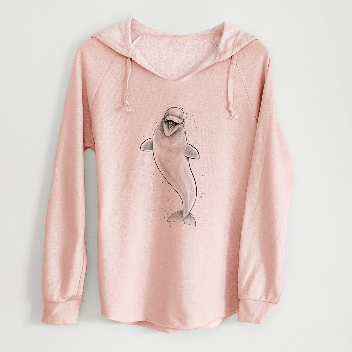 Blush pink women's Cali Wave hooded sweatshirt laid flat, printed with a black ink illustration of a smiling beluga whale swimming upward.