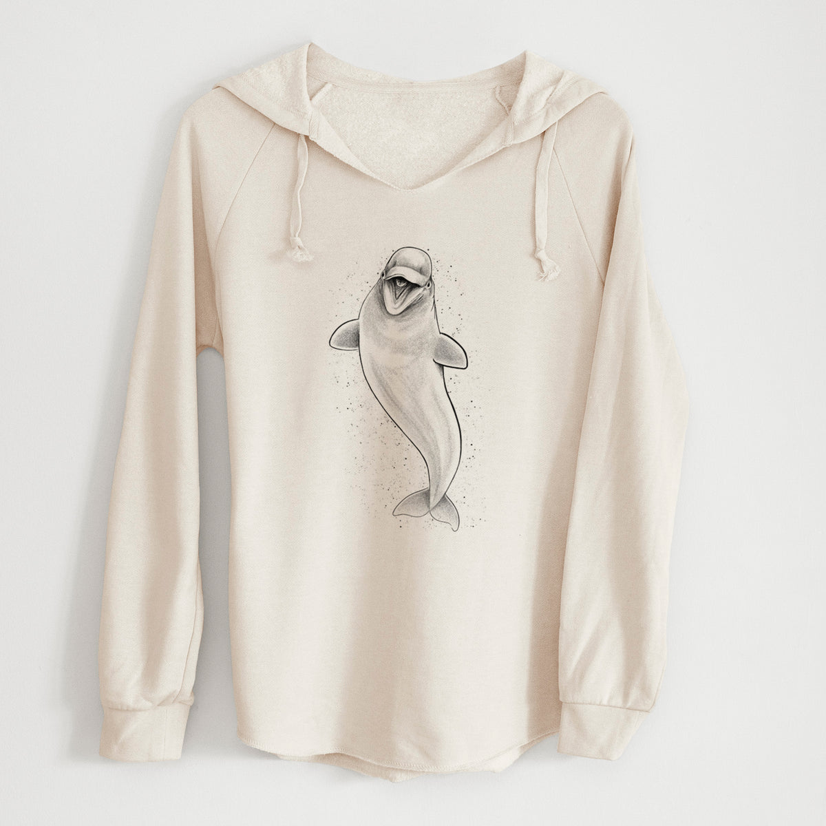 Bone cream women's Cali Wave hooded sweatshirt laid flat, printed with a black ink illustration of a smiling beluga whale swimming upward.
