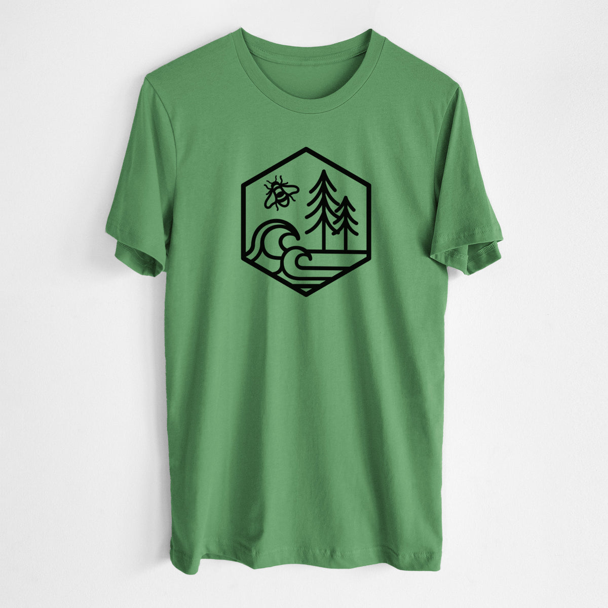 Leaf green lightweight cotton t-shirt laid flat, printed with a black line art hexagon holding a bee, ocean waves and pine trees.
