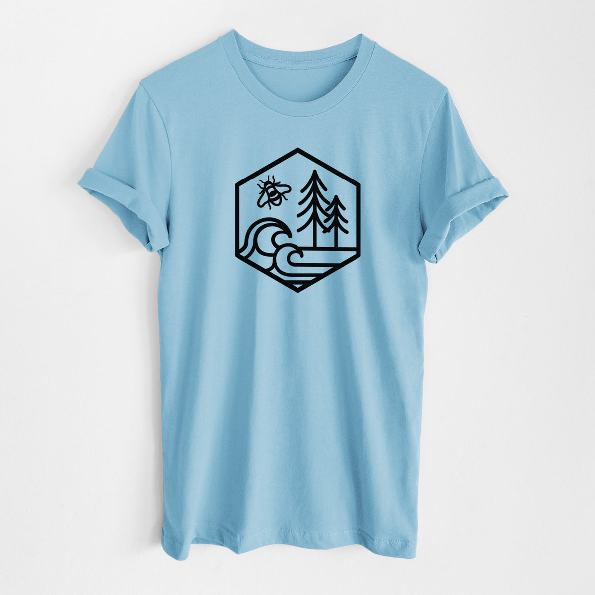 Ocean blue lightweight cotton t-shirt laid flat, printed with a black line art hexagon holding a bee, ocean waves and pine trees.