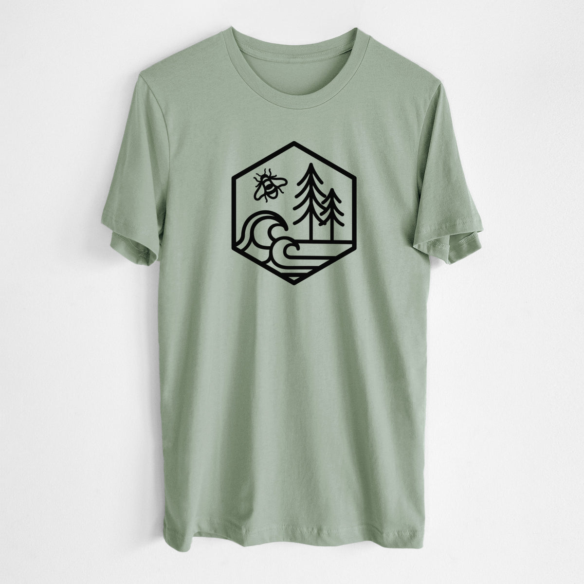 Sage green lightweight cotton t-shirt laid flat, printed with a black line art hexagon holding a bee, ocean waves and pine trees.