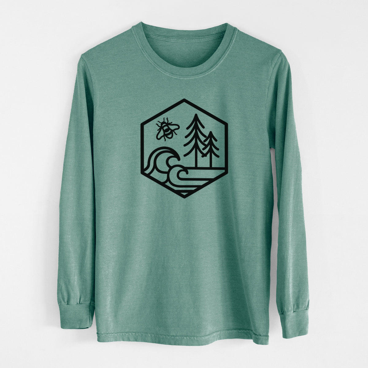 Pine green Comfort Colors long sleeve shirt laid flat, printed with a black line art hexagon holding a bee, ocean waves and pine trees.