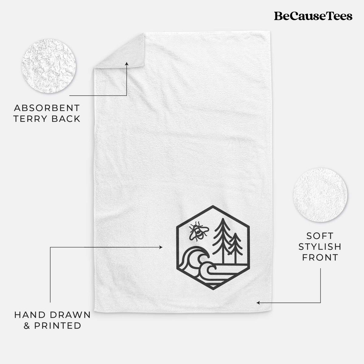 White hand towel printed with a black line art hexagon holding a bee, ocean waves and pine trees.