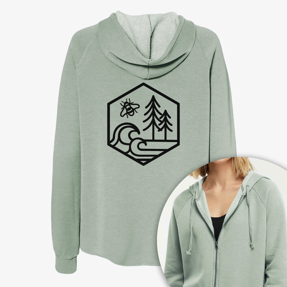 Women's Cali Wave zip-up sweatshirt printed with a black line art hexagon holding a bee, ocean waves and pine trees, with a close-up of the zipper.