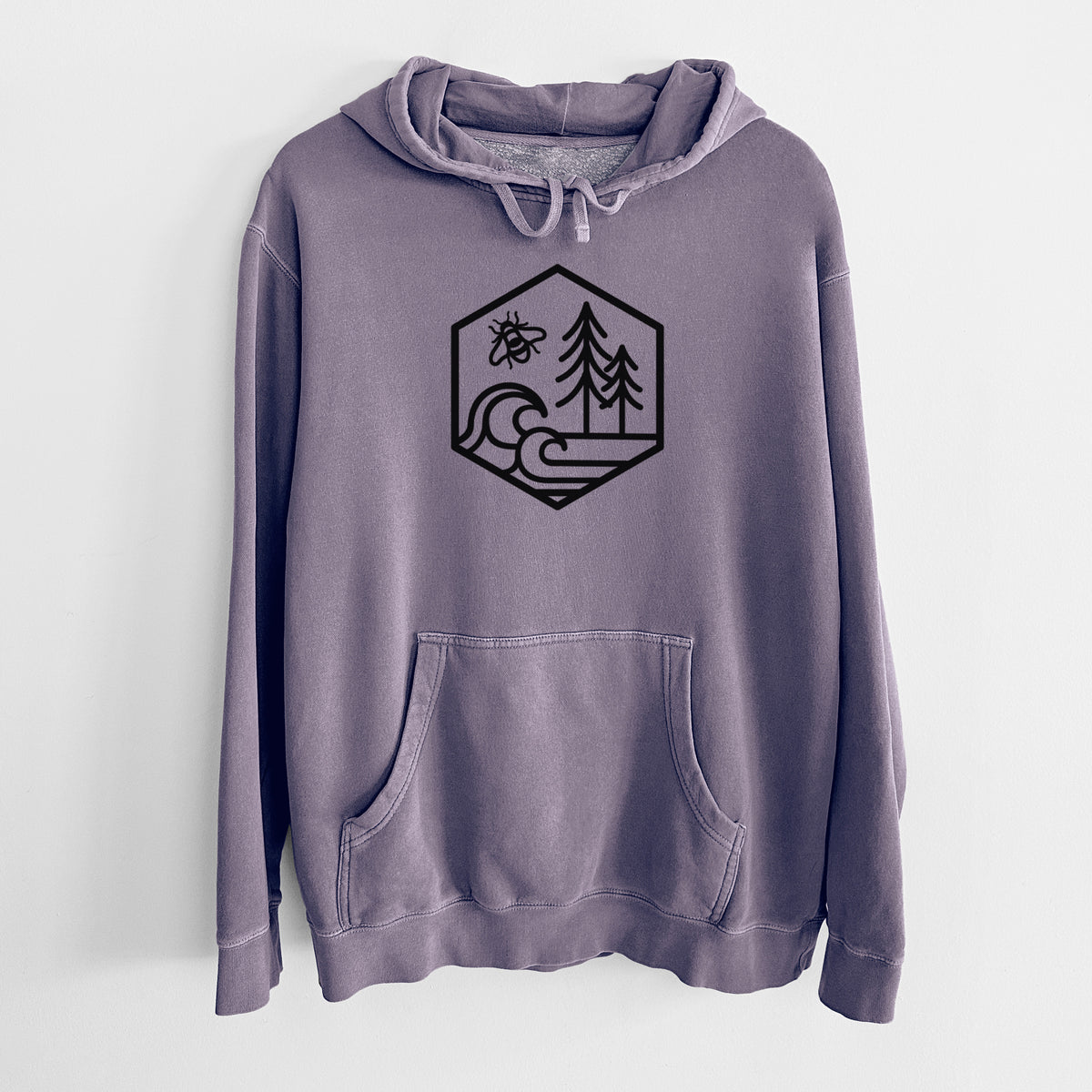 Plum purple pigment dyed hoodie laid flat, printed with a black line art hexagon holding a bee, ocean waves and pine trees.
