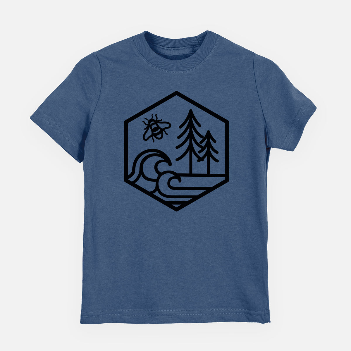 Indigo blue youth t-shirt laid flat, printed with a black line art hexagon holding a bee, ocean waves and pine trees.