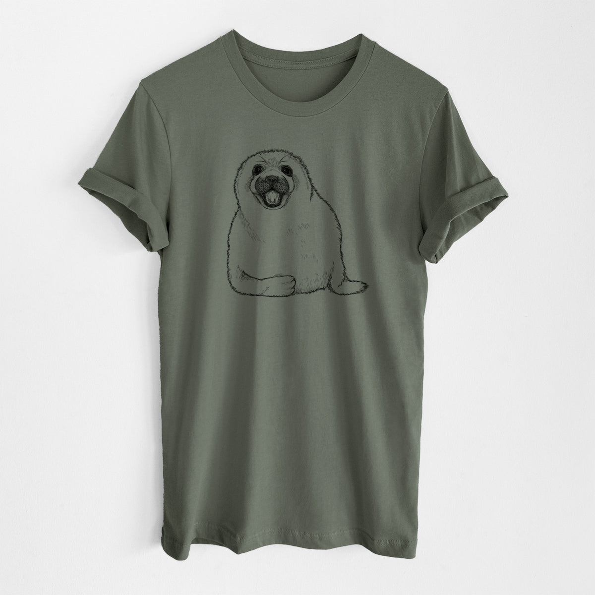 Military green lightweight cotton t-shirt laid flat, printed with a black ink illustration of a smiling harp seal pup lying down.