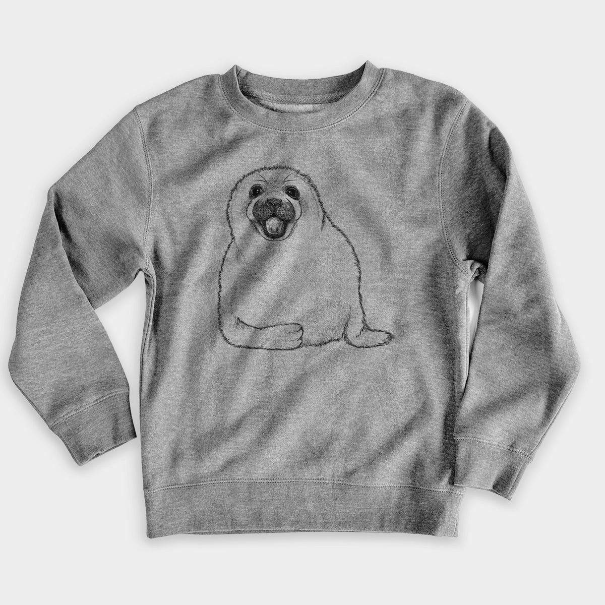 Nickel grey youth crewneck sweatshirt laid flat, printed with a black ink illustration of a smiling harp seal pup lying down.