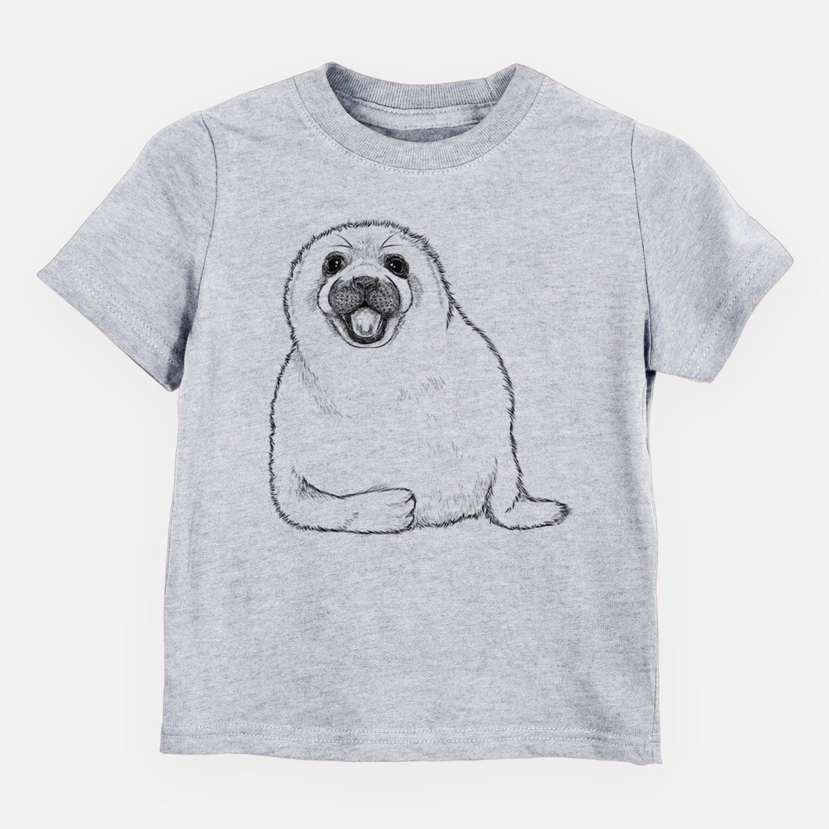 Heather grey toddler t-shirt laid flat, printed with a black ink illustration of a smiling harp seal pup lying down.
