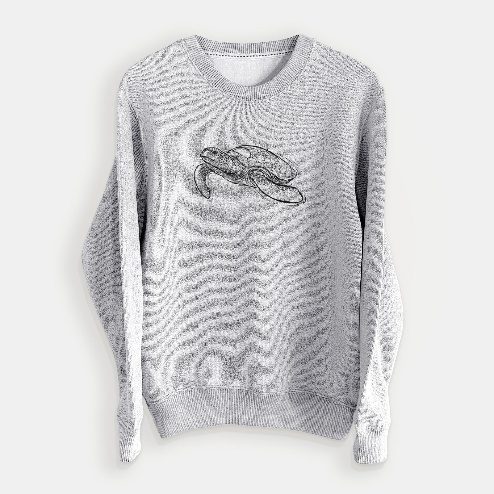 Salt and pepper knit sweatshirt laid flat, printed with a black ink illustration of a hawksbill sea turtle swimming, with a patterned shell.