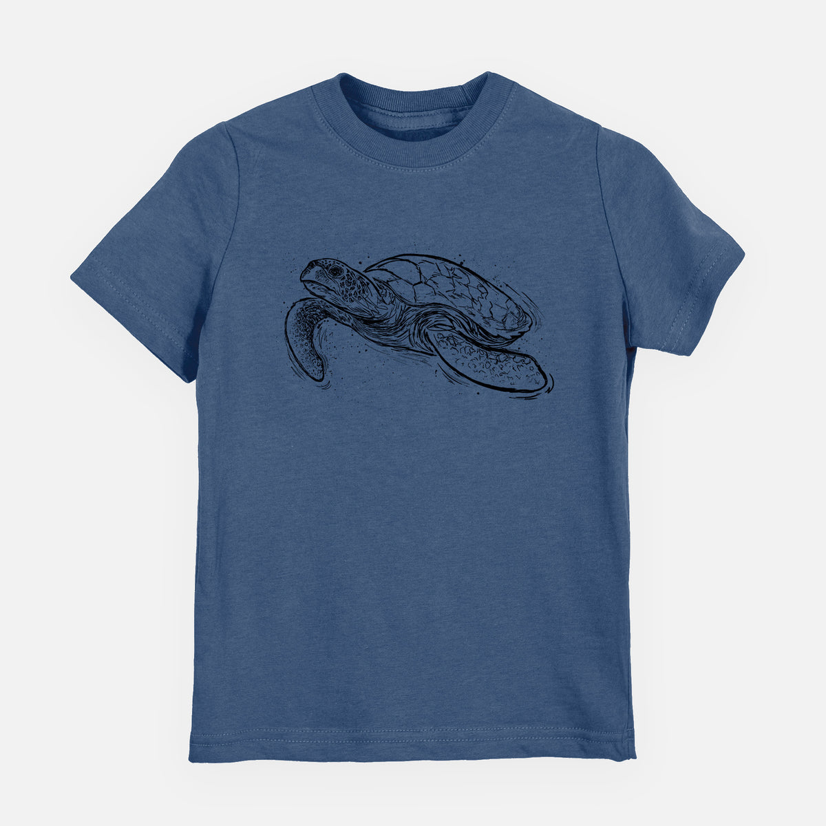 Indigo blue youth t-shirt laid flat, printed with a black ink illustration of a hawksbill sea turtle swimming, with a patterned shell.