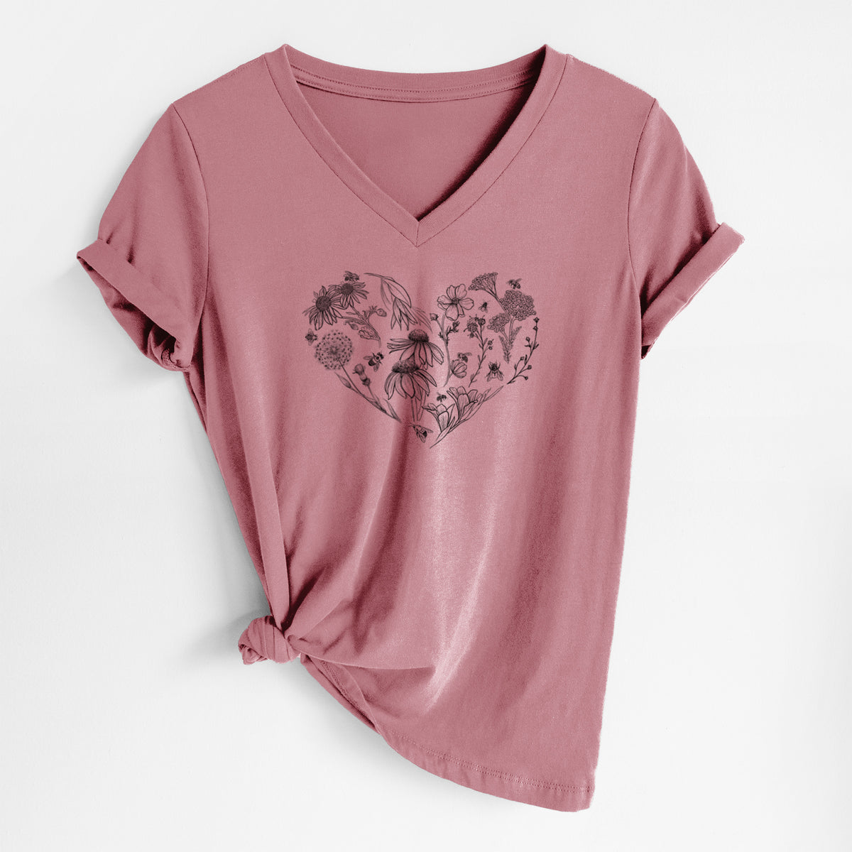 Mauve pink women's relaxed fit cotton V-neck t-shirt laid flat, printed with a heart shape filled with black ink flowers and bees.