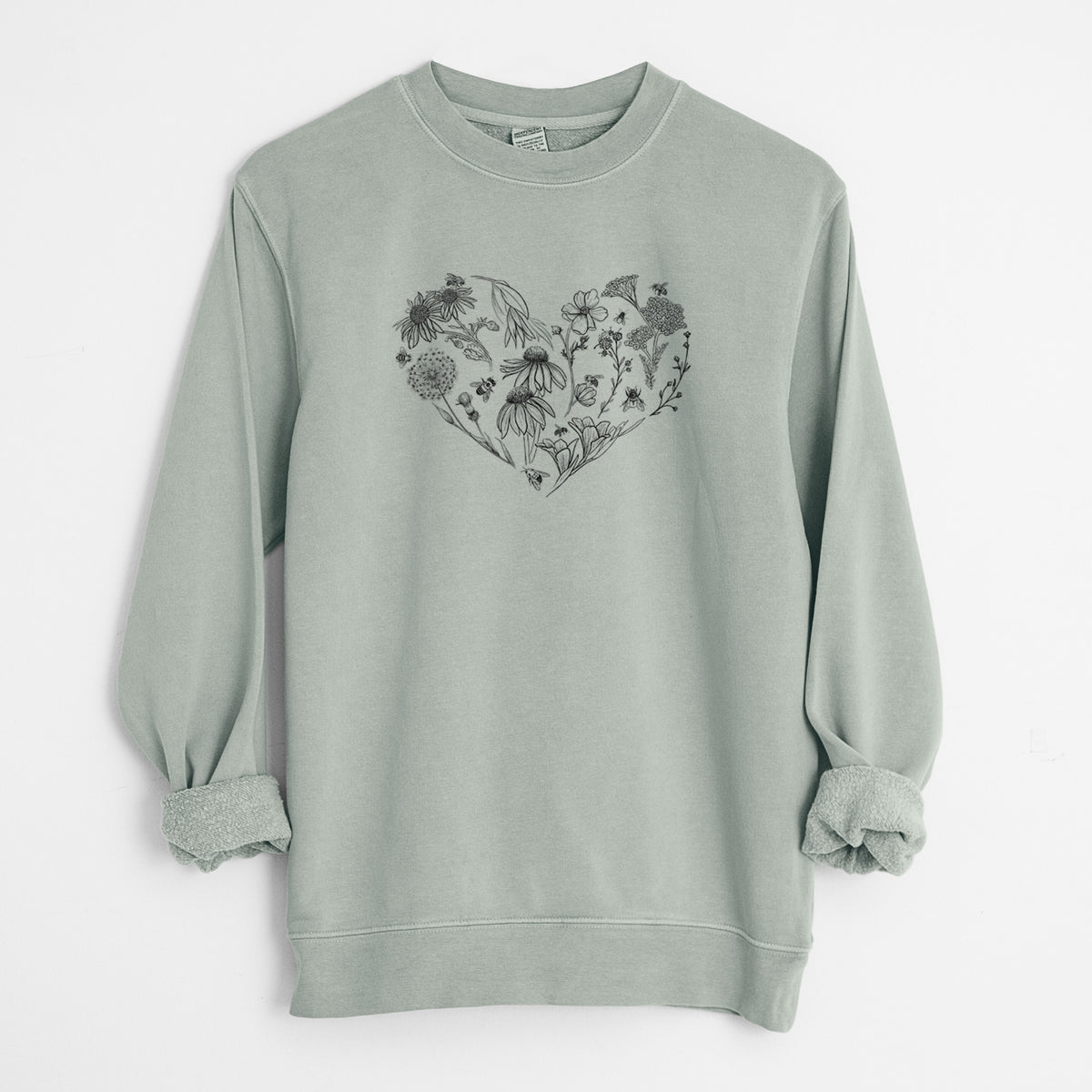 Sage green pigment dyed crewneck sweatshirt laid flat with the sleeves rolled, printed with a heart shape filled with black ink flowers and bees.