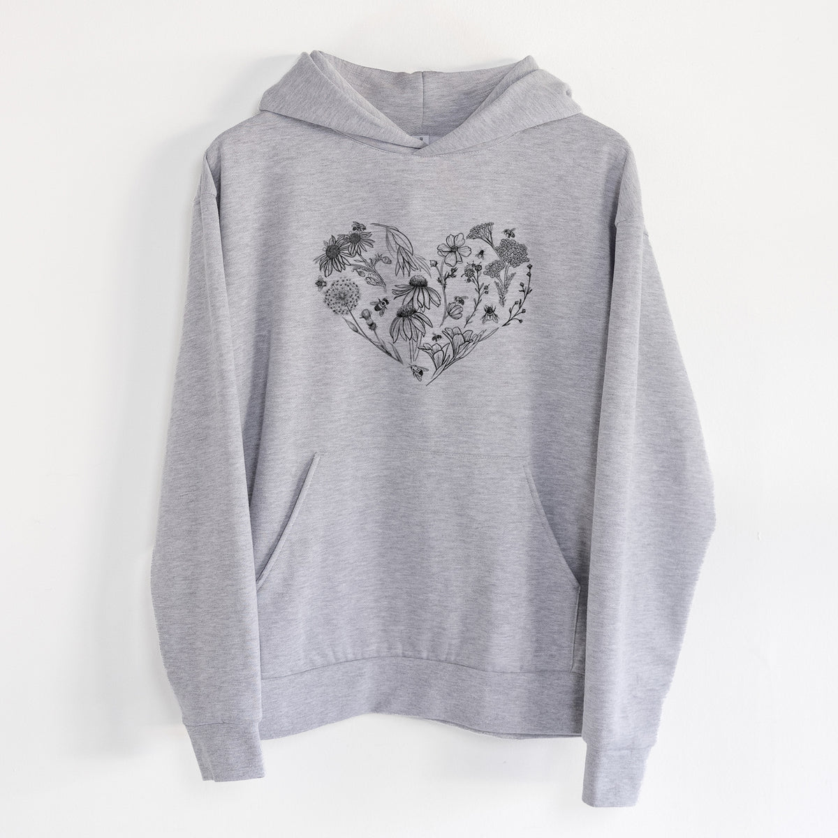 Heart Full of Blooms and Bees - Statement Midweight Hoodie in Heather Grey, hanging on a white wall, with a front kangaroo pocket and no drawcords.