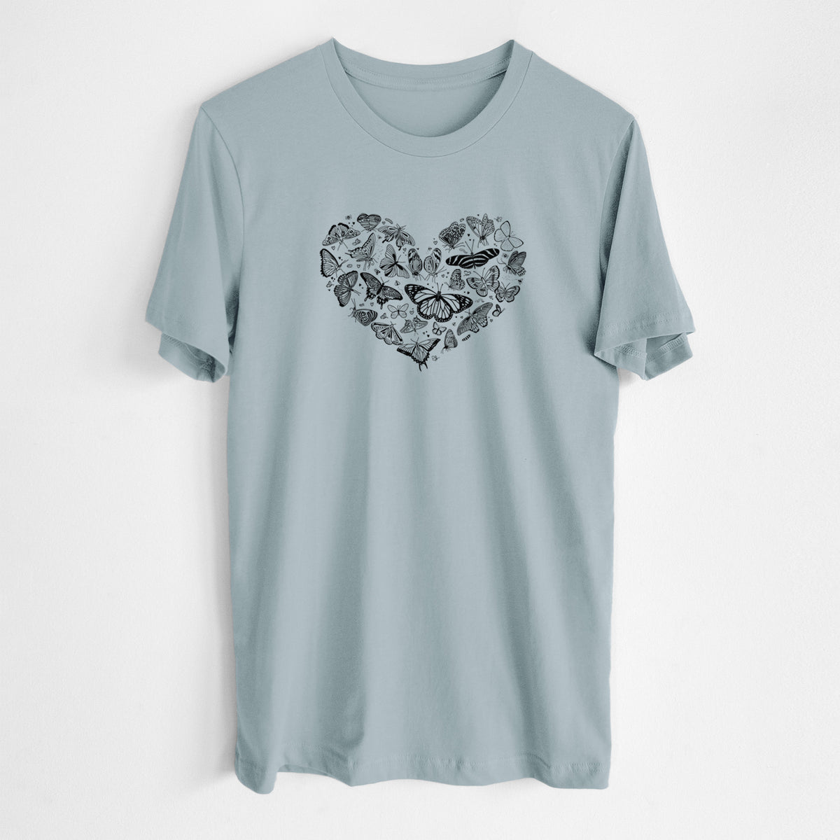 Vintage denim lightweight cotton t-shirt laid flat, printed with a heart shape filled with small black ink butterflies and moths.