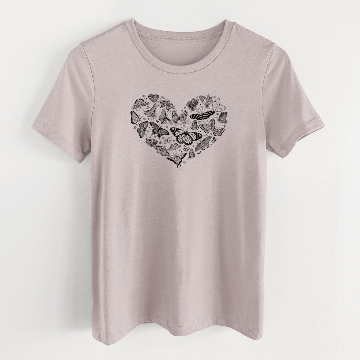Pink gravel women's relaxed fit cotton t-shirt laid flat, printed with a heart shape filled with small black ink butterflies and moths.